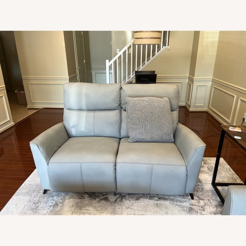 Used Raymour & Flanigan Light Gray Leather Loveseat for sale on AptDeco