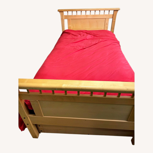 Used Solid Maple Twin Bed - Roll Out Storage Drawers for sale on AptDeco