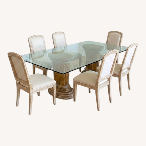 Used Large Glass Table W 9 Chairs for sale on AptDeco