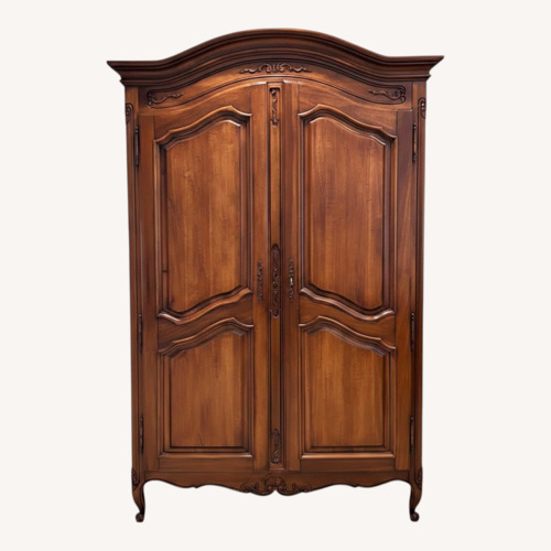 Used Dark Brown Wood Armoire for sale on AptDeco