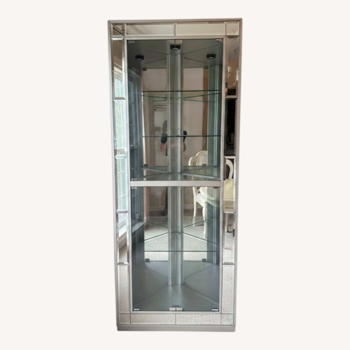 Used Two Curio Cabinets  for sale on AptDeco