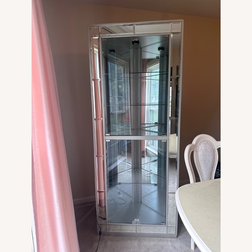 Used Two Curio Cabinets  for sale on AptDeco