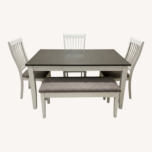 Used Wooden Dining Table and Chairs for sale on AptDeco