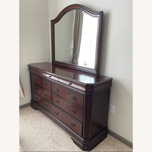 Used Ashley Furniture Hamlyn Dark Brown Wood Dresser for sale on AptDeco