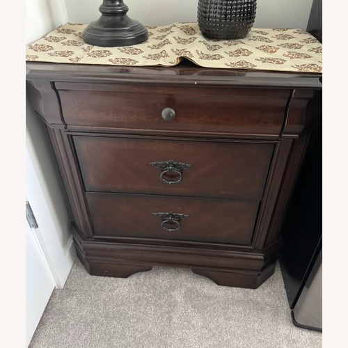 Used Ashley Furniture Hamlyn Dark Brown Wood Nightstand for sale on AptDeco