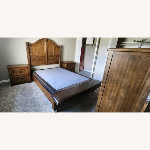 Used Eric Church Solid Wood Queen Bed (Pulaski) for sale on AptDeco
