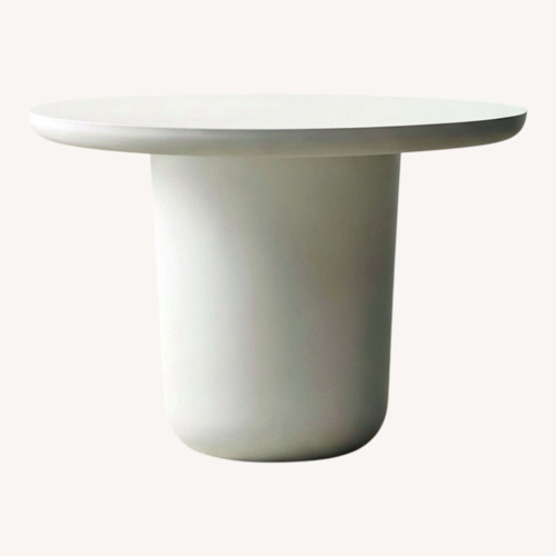 Used CB2 Lola 45" Round Ivory Concrete Dining Table for sale on AptDeco