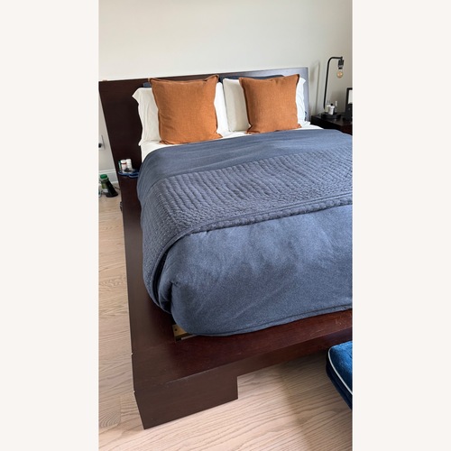 Used Crate & Barrel Asher Dark Brown Wood Queen Bed for sale on AptDeco