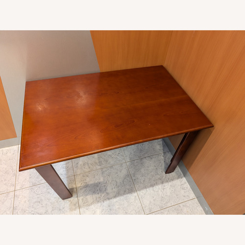 Used Dark Brown Wood Play Table for sale on AptDeco