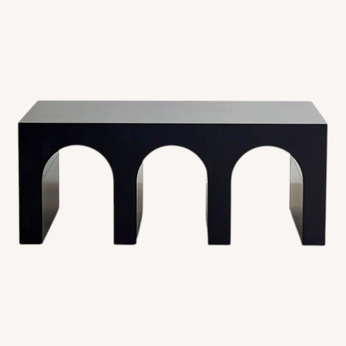 Used Urban Outfitters Mason Arc Black Wood Coffee Table for sale on AptDeco