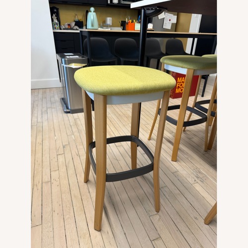 Used Teknion Zones Backless Yellow Wood Stool for sale on AptDeco