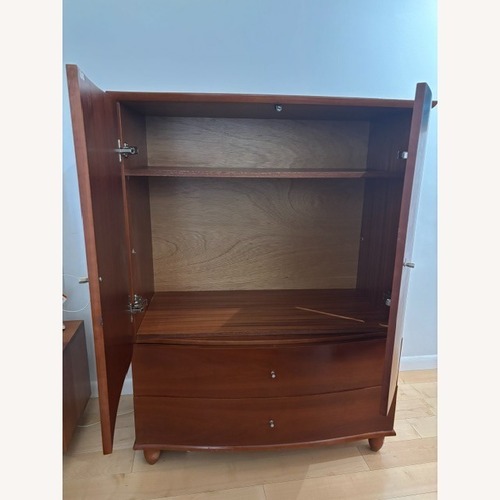 Used Mobican Armoire Warm Cherry Finish for sale on AptDeco