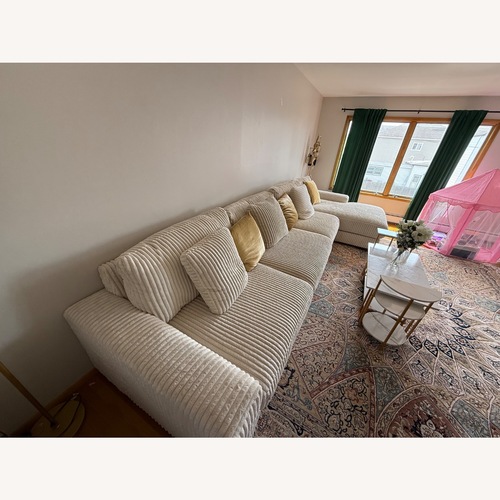 Used Ashley Furniture Natural 3+ Piece Sectional for sale on AptDeco