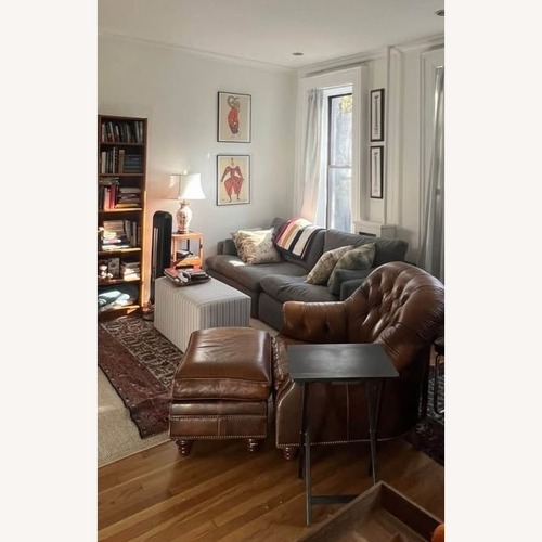 Used Hancock and Moore Leather Chair and Ottoman for sale on AptDeco