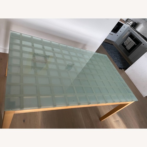 Used Ligne Roset Natural Glass Dining Table for sale on AptDeco