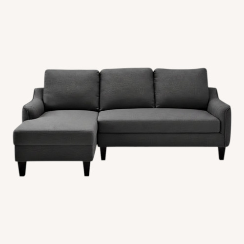 Used Ashley Furniture Jarreau Gray Sofa Chaise Sleeper for sale on AptDeco