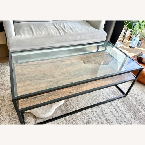 Used Modern Industrial Glass & Wood Coffee Table for sale on AptDeco