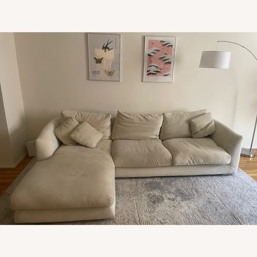 Used Feathers Sectional Sofa for sale on AptDeco