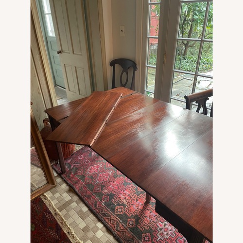 Used Antique Dark Brown Wood Dining Table 4 Chairs for sale on AptDeco