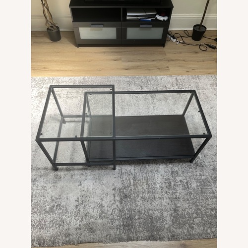 Used IKEA Vittsjö Black Glass Coffee Table for sale on AptDeco