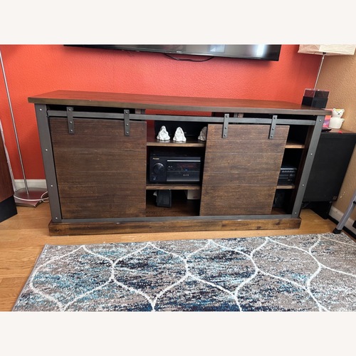 Used Wood Barn Media Console with Sliding Doors for sale on AptDeco