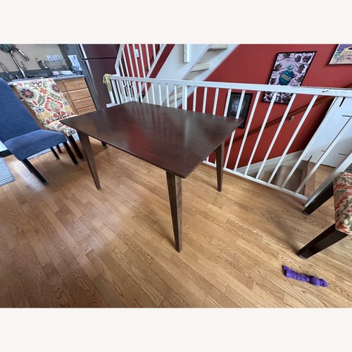 Used World Market Wood Table + 4 Chairs for sale on AptDeco