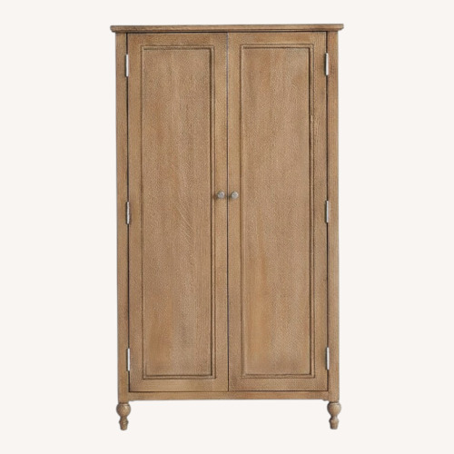 Used Pottery Barn Astoria Wood Armoire for sale on AptDeco