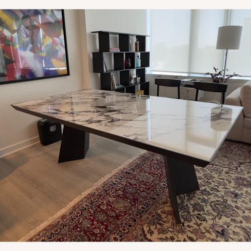 Used Andreu World Black Marble Dining Table for sale on AptDeco