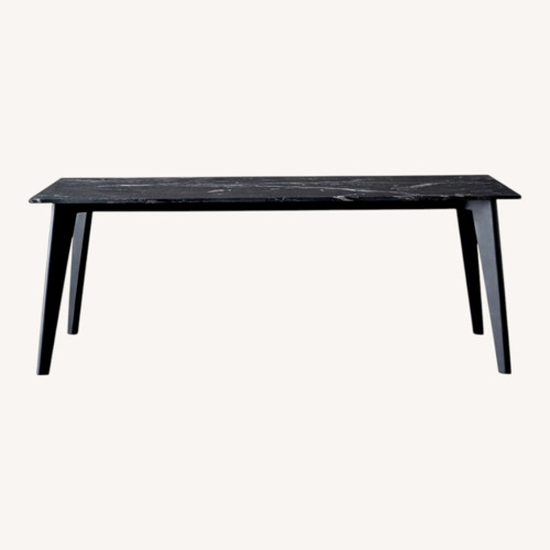 Used CB2 Harper Black Marble Dining Table for sale on AptDeco