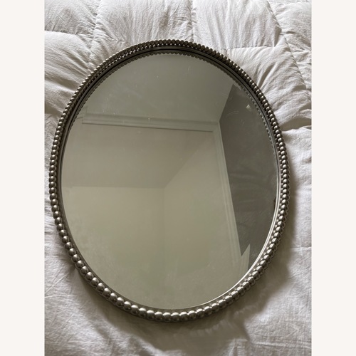 Used Uttermost Silver Metal Wall Mirror for sale on AptDeco