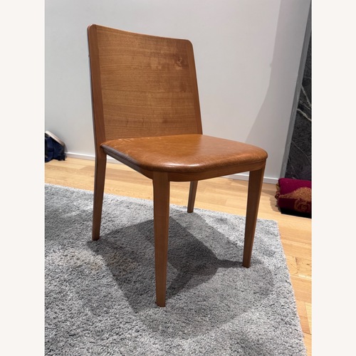 Used Design Somonini Wing Light Brown Wood Dining Chairs for sale on AptDeco