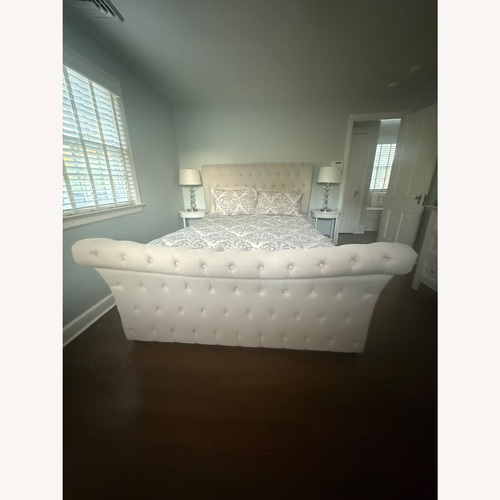 Used Raymour & Flanigan Odette Queen Sleigh Bed for sale on AptDeco