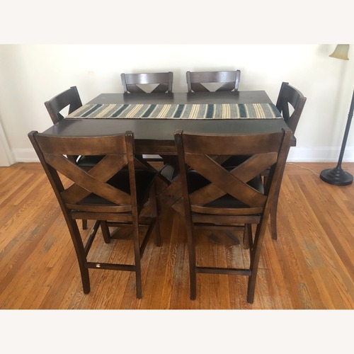Used Bob's Discount Furniture Dark Brown Dining Set for sale on AptDeco