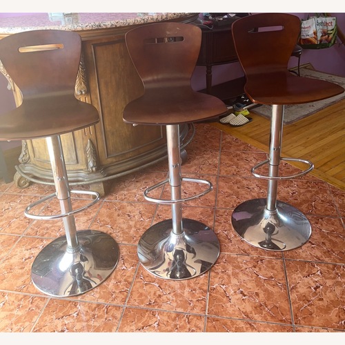 Used Dark Brown Wood Bar Chairs for sale on AptDeco