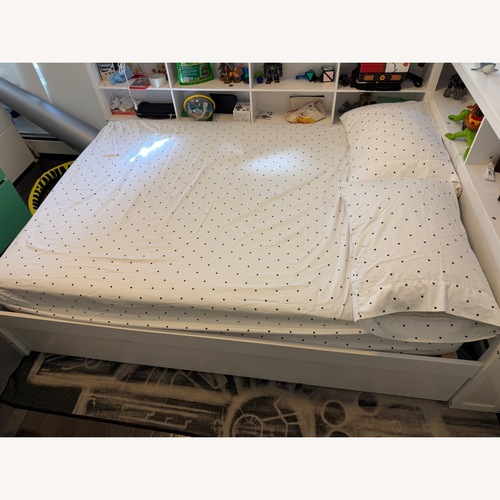 Used White Wood Full Bed with Trundle for sale on AptDeco