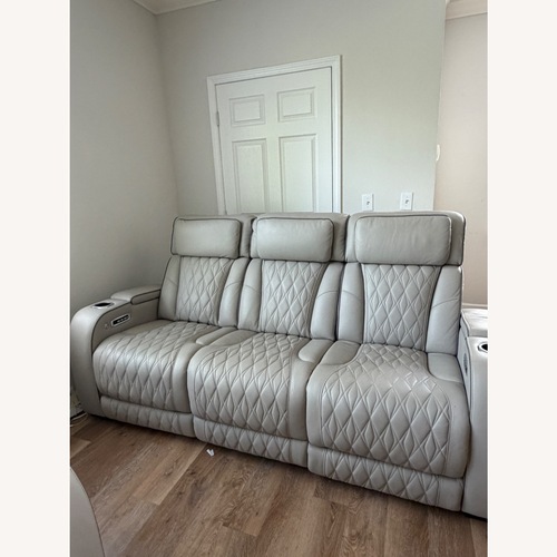 Used Ashley Furniture Boyington Dual Power Leather Reclining Sofa for sale on AptDeco