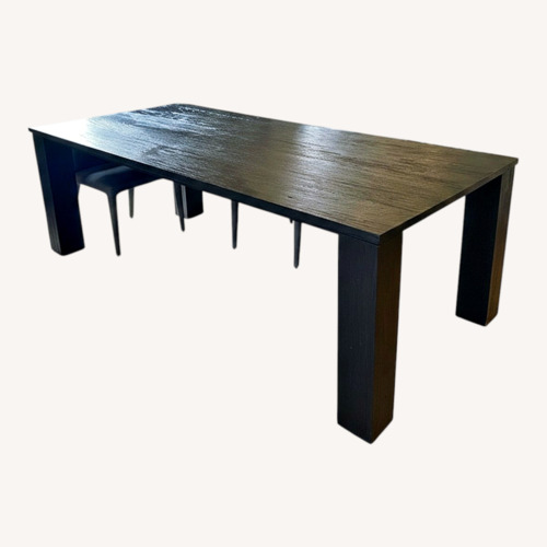 Used Black Hardwood Dining Table for sale on AptDeco