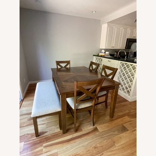 Used Dining Table and Chairs with Bench and Expandable for sale on AptDeco