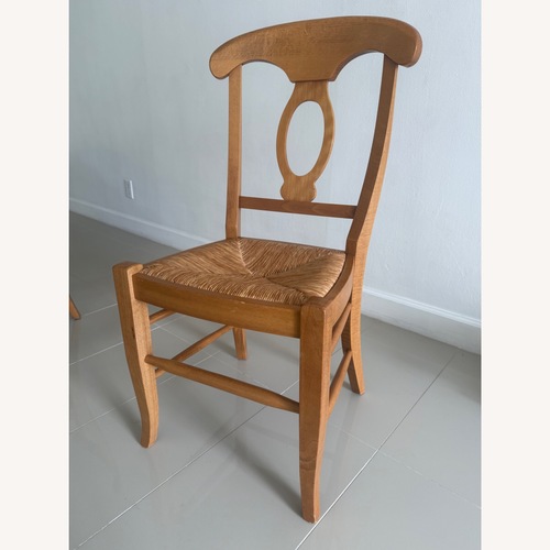 Used Pottery Barn Napoleon Natural Wood Dining Chair for sale on AptDeco