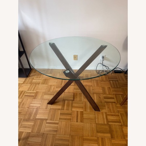 Used Poly and Bark Glass Dining Table for sale on AptDeco