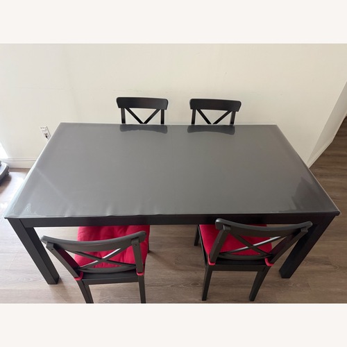 Used IKEA Ålhult / Nordmansskär Black Wood Dining Set for sale on AptDeco