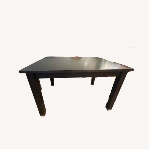 Used West Elm Dark Brown Wood Dining Table for sale on AptDeco