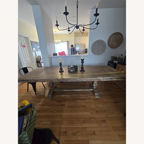 Used Pier 1 Imports Natural Wood Dining Table for sale on AptDeco