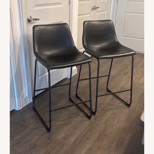 Used Counter Height Black Leather Bar Stools  for sale on AptDeco