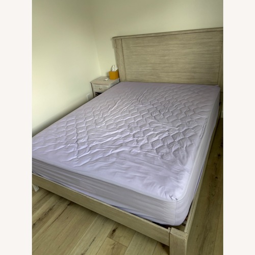 Used Light Gray Wood Queen Bed for sale on AptDeco