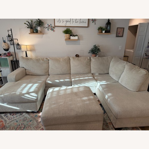 Used Ashley Furniture Fabric 2 Piece Sectional and Ottoman for sale on AptDeco