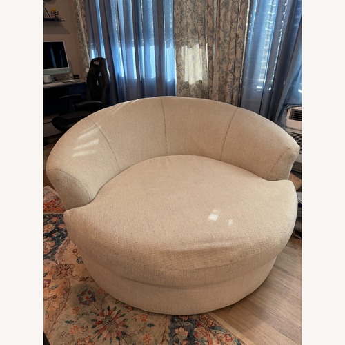 Used Ashley Furniture Cambri Oversized Swivel Chair for sale on AptDeco