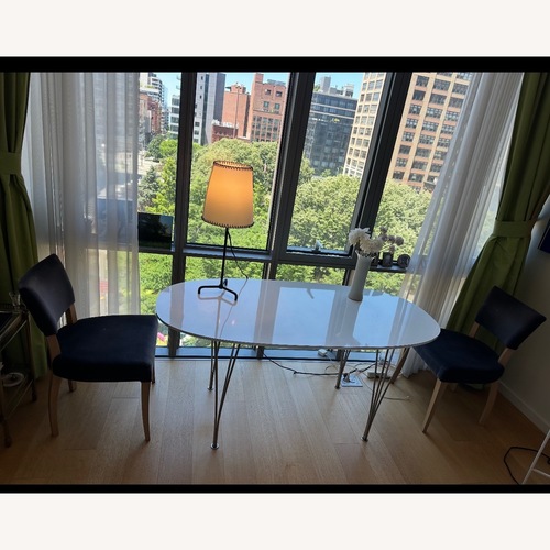 Used Fritz Hansen Superellipse Dining Table for sale on AptDeco