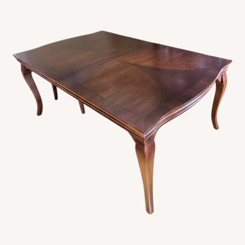 Used Dark Brown Dining Table for sale on AptDeco