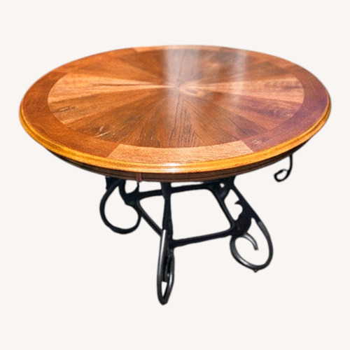 Used Dark Brown Wood Dining Table for sale on AptDeco